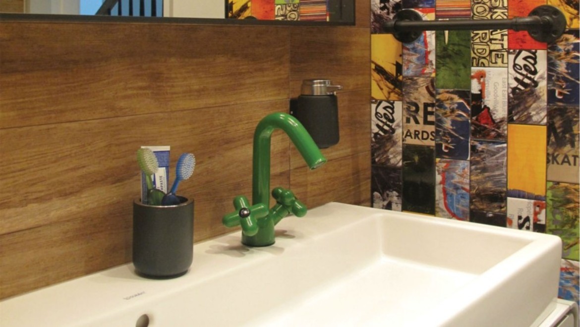 Sink in skateboard themed bathroom, Greenwich Village, New York