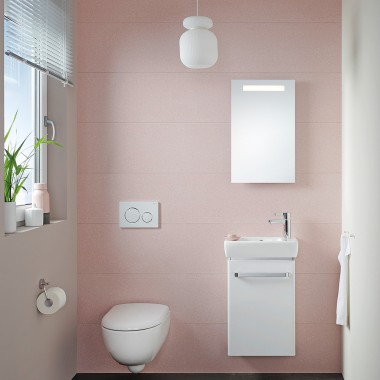 Small guest bathroom with compact handrinse basin and wall-hung toilet