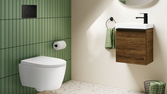 Small guest bathroom under a sloped roof, with Geberit in-wall systems
