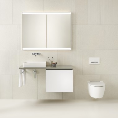 White bathroom with wall-hung washplace and toilet (© Geberit)