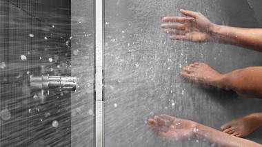 Person showering in a floor-even shower