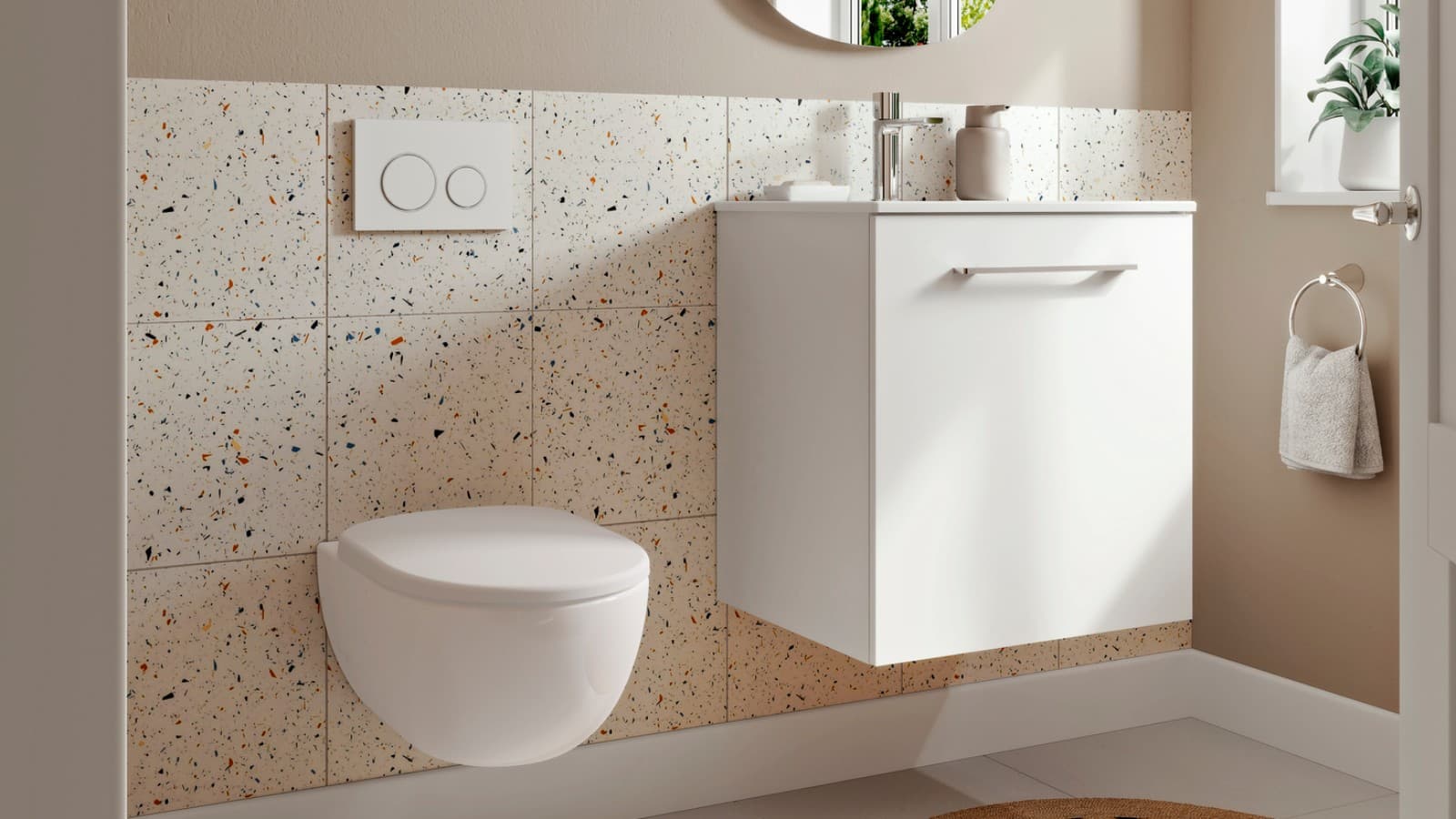 Small Geberit bathroom with wall-hung toilet and washbasin Small Geberit bathroom with wall-hung toilet and washbasin