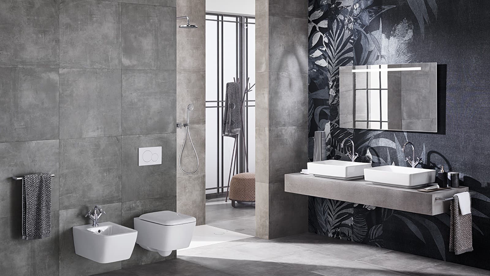 Sigma01 Round flush actuator plate in elegant bathroom with bidet Sigma01 Round flush actuator plate in elegant bathroom with bidet